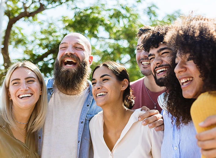 Happy people celebrating outdoors
